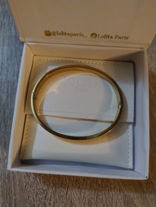 Pulsera rígida de oro y acero