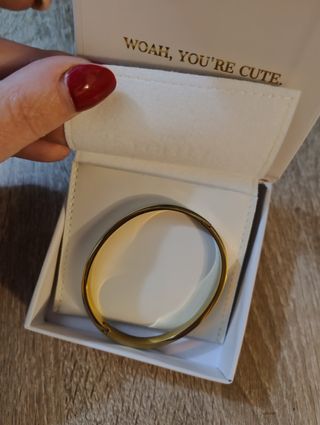 Pulsera rígida de oro y acero