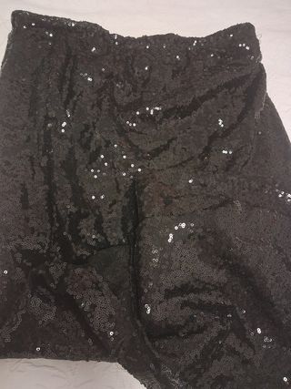 Falda de lentejuelas negra + regalo de top negro.