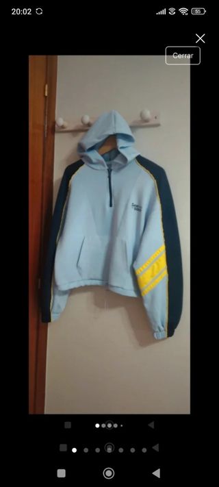 Sudadera Bershka azul y amarilla Talla S