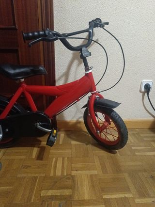 Bicicleta infantil  con ruedines