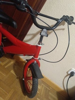 Bicicleta infantil  con ruedines