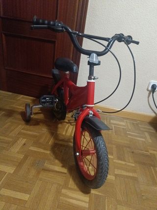 Bicicleta infantil  con ruedines