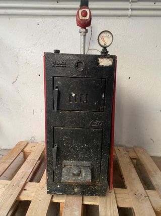 Caldera de leña Roca