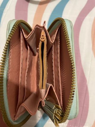 Cartera YSL verde con borla