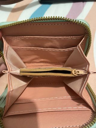 Cartera YSL verde con borla