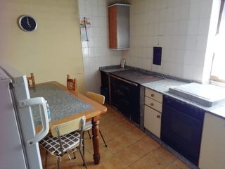 Casa de piedra con garaje