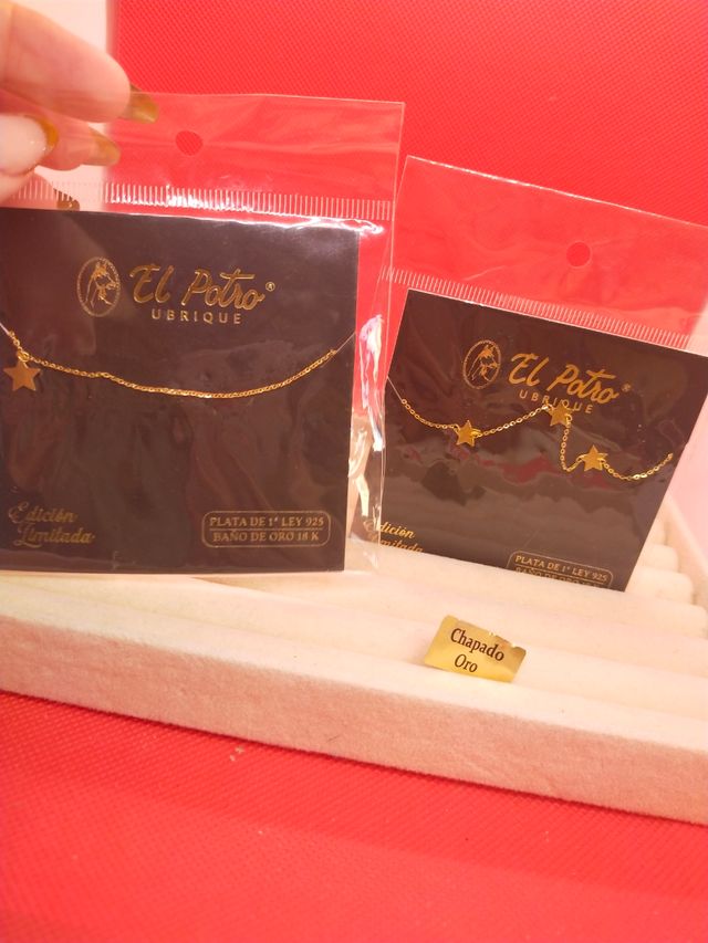 Collana e bracciale in argento dorato El Potro