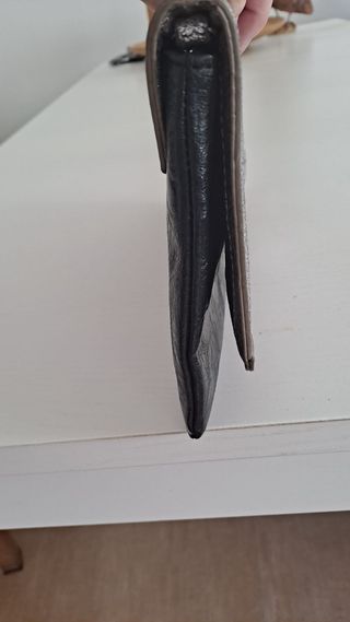 Bolso de mano negro y plata con estrellas