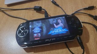 PSP 1000 + juegos