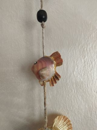 Segnavento marino con pesci