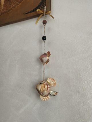 Segnavento marino con pesci