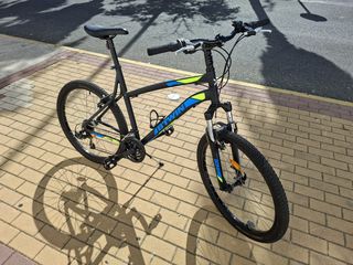 Bicicleta B-twin Rock Rider 340 + casco b'twin