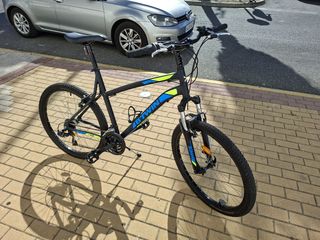Bicicleta B-twin Rock Rider 340 + casco b'twin