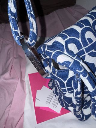 Bolso TOUS azul con estampado geométrico