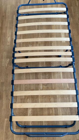 Cama plegable.