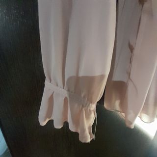 Blusa de manga larga con un diseño plisado