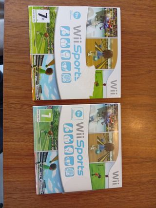 Nintendo Wii con manuales Wii Sports y Wii Play