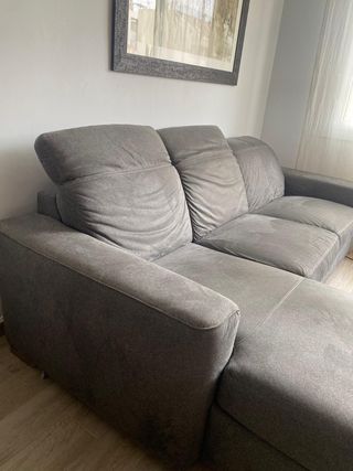Sofá cama Natuzzi con chaise longue gris