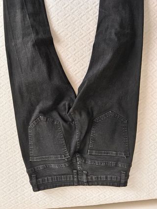 Jeans neri strappati