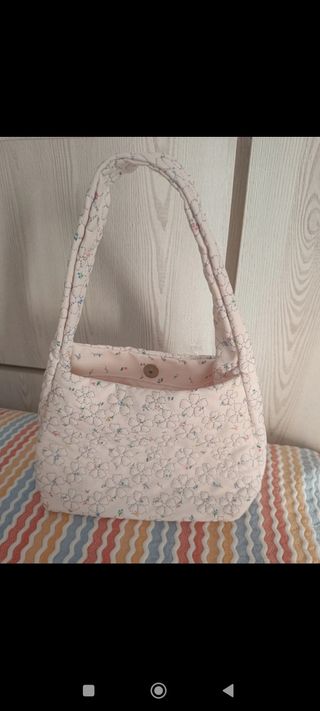 Bolso rosa y blanco con estampado floral