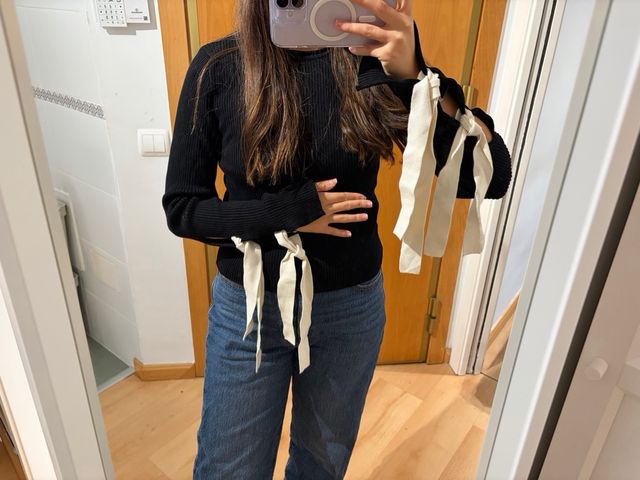 Jersey Zara negro con lazos en puños