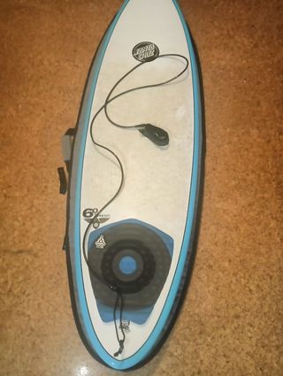 Tabla de surf azul con neopreno