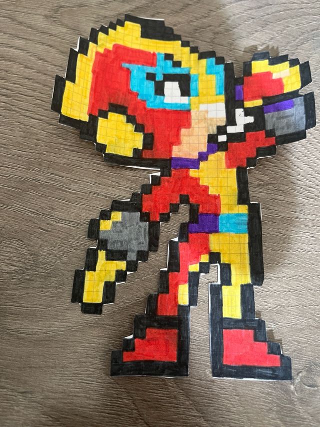 Pixel arts hechos a mano y  plastificados