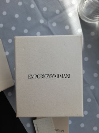 Emporio armani reloj plateado y negro.