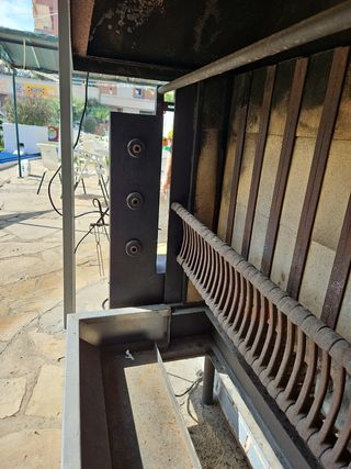 Máquina asar pollos a leña