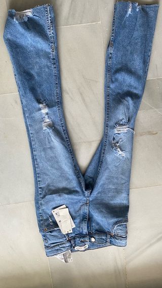 Pantalones vaqueros desgastados