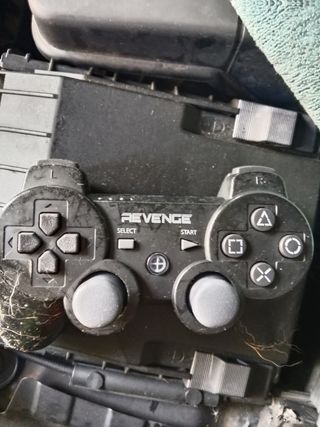 PlayStation 2 Negra con mandos