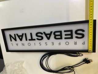 Cartel retroilumidado