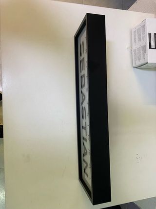 Cartel retroilumidado