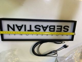 Cartel retroilumidado