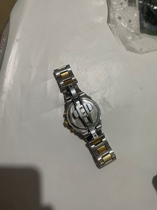 Reloj Guess bicolor dorado y plateado