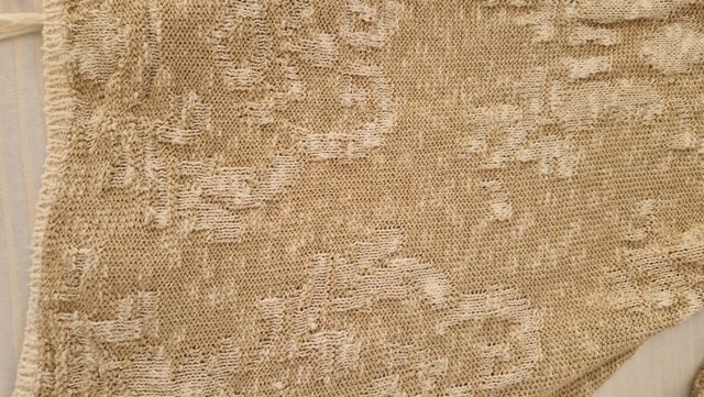 Chaqueta de punto beige y blanco