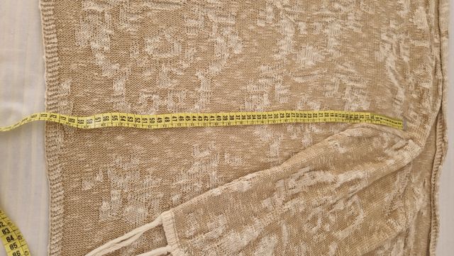 Chaqueta de punto beige y blanco