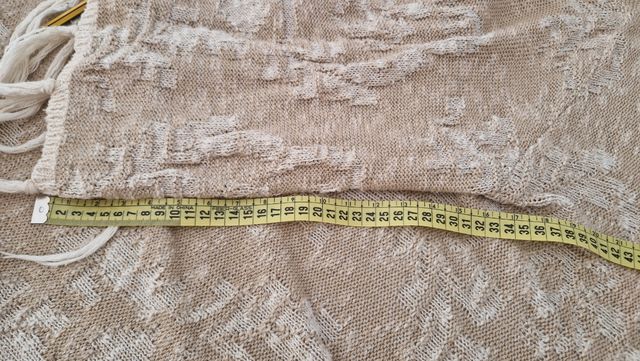 Chaqueta de punto beige y blanco