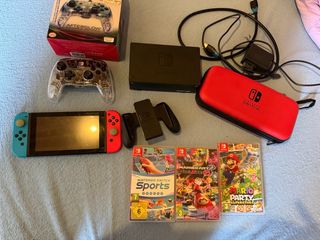 Nintendo Switch + Accesorios y Juegos
