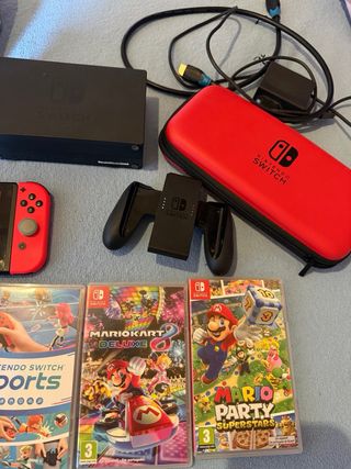 Nintendo Switch + Accesorios y Juegos

