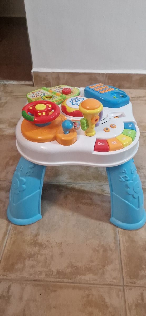 Mesa de actividades Infantil. Patinete Infantil.