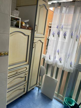 Muebles de cocina beige y azul
