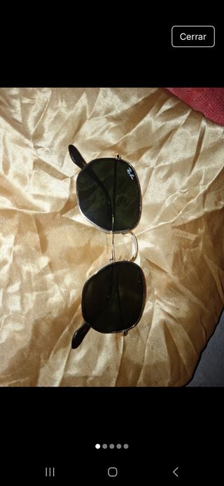 Gafas de sol Ray Ban doradas poco uso cristal azul