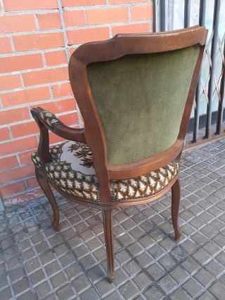 Sillón antiguo tapizado floral