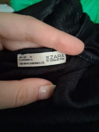 Blusa cruzada brillante mangas abullonadas