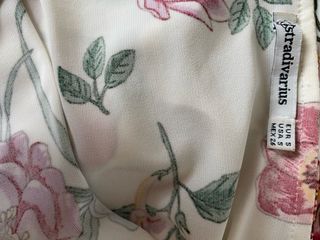 Body floral blanco con volantes