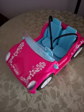 Coche de juguete rosa descapotable