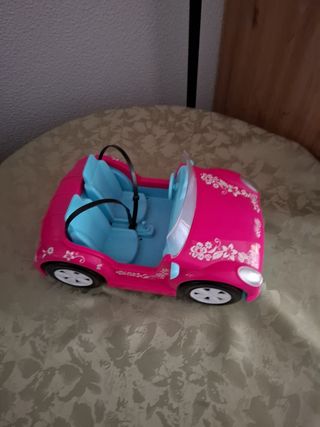 Coche de juguete rosa descapotable