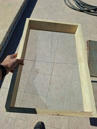 Criba de madera y metal